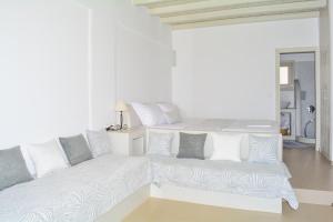 A bed or beds in a room at Notos Studios