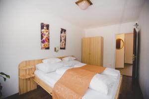 Posteľ alebo postele v izbe v ubytovaní Jerry Apartman