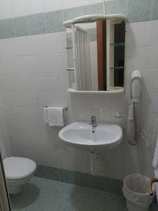 Koupelna v ubytování Hotel ILLI