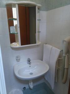Koupelna v ubytování Hotel ILLI