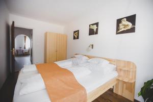 Posteľ alebo postele v izbe v ubytovaní Jerry Apartman