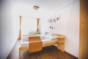 Posteľ alebo postele v izbe v ubytovaní Jerry Apartman
