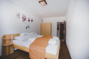 Posteľ alebo postele v izbe v ubytovaní Jerry Apartman