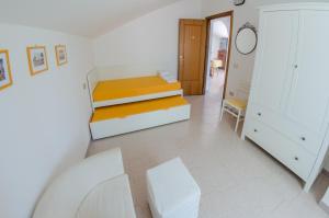 A bed or beds in a room at Casa Vacanze "Ro & Se" a Palinuro IT, Bandiera Blu anche per il 2025