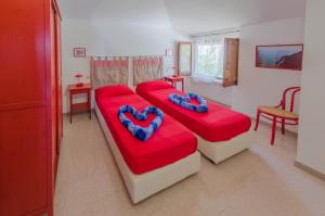 เตียงในห้องที่ Casa Vacanze "Ro & Se" a Palinuro IT, Bandiera Blu anche per il 2023