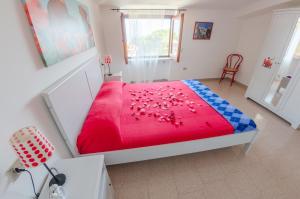 A bed or beds in a room at Casa Vacanze "Ro & Se" a Palinuro IT, Bandiera Blu anche per il 2025