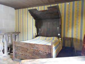 Postel nebo postele na pokoji v ubytování Auberge de l'Abbatiale