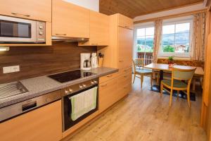 Kuchyňa alebo kuchynka v ubytovaní Appartement Alpenfex