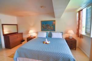Ένα ή περισσότερα κρεβάτια σε δωμάτιο στο Moon San Villa at the Blue Lagoon