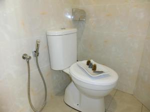 Koupelna v ubytování Carlsun Hotel