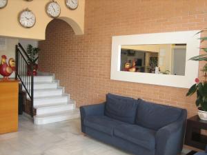 Posezení v ubytování Hostal Madruga