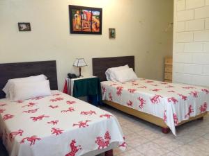 Postel nebo postele na pokoji v ubytování Hotel MundialCity + 37 fotografií