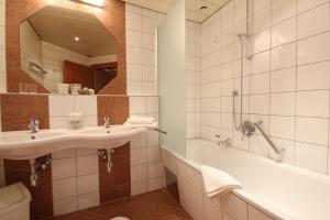 Ένα μπάνιο στο Hotel Gasthof Neuner