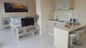 Kuchyň nebo kuchyňský kout v ubytování Guesthouse Laterna + 21 fotografií