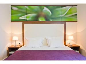 Voodi või voodid majutusasutuse Bastion Luxury Rooms toas