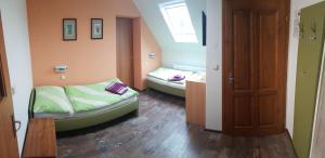 Posteľ alebo postele v izbe v ubytovaní Hotel Olga