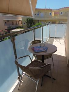 A balcony or terrace at Angelica Studios and Apartments