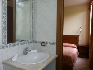 Ванна кімната в Hotel Tempio di Apollo
