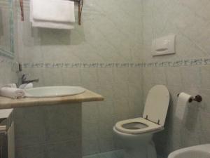 Ванна кімната в Hotel Tempio di Apollo