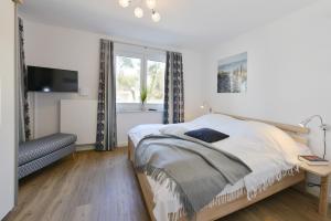 Postel nebo postele na pokoji v ubytování Ferienwohnung Sonnenschein