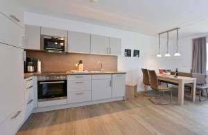 Kuchyň nebo kuchyňský kout v ubytování Ferienwohnung Sonnenschein