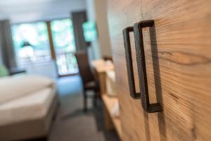 Postel nebo postele na pokoji v ubytování Hotel Rosengarten