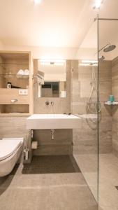 Ванная комната в Michels Inselhotel Vier Jahreszeiten