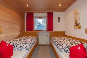 Ένα ή περισσότερα κρεβάτια σε δωμάτιο στο Gästehaus Lipp