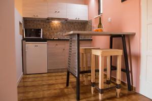 Kuchyň nebo kuchyňský kout v ubytování Nireas Hotel