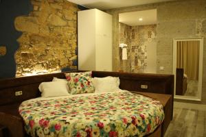 Letto o letti in una camera di Art'Otel Barcelos