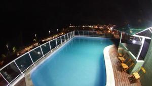 Bazén v ubytování Anjos Praia Hotel nebo v jeho okolí