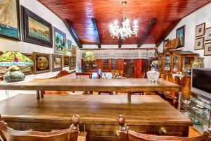 a dining room with a large wooden table at Royal Antique Apartment in Split