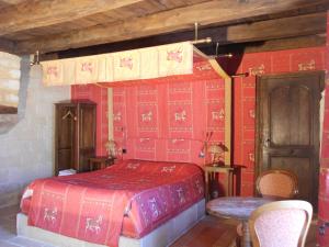 Postel nebo postele na pokoji v ubytování Auberge de l'Abbatiale