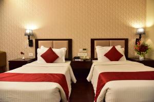 Postel nebo postele na pokoji v ubytování Hotel JIVA