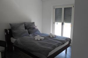 Voodi või voodid majutusasutuse Albergo Porta Verzasca toas