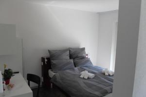Voodi või voodid majutusasutuse Albergo Porta Verzasca toas