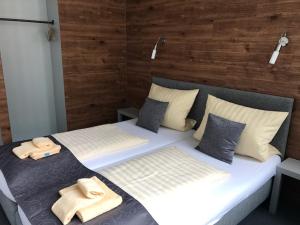 Postel nebo postele na pokoji v ubytování CREO Munich City