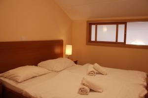 Postel nebo postele na pokoji v ubytování Apartments Unija Duga Uvala