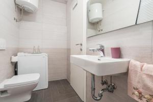Koupelna v ubytování Apartments Windrose