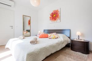 Postel nebo postele na pokoji v ubytování Apartments Windrose
