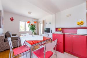 Kuchyň nebo kuchyňský kout v ubytování Apartments Windrose