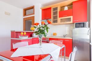 Kuchyň nebo kuchyňský kout v ubytování Apartments Windrose