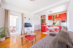 Kuchyň nebo kuchyňský kout v ubytování Apartments Windrose