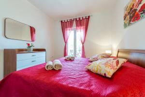 Postel nebo postele na pokoji v ubytování Apartments Windrose