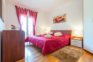 Postel nebo postele na pokoji v ubytování Apartments Windrose