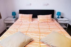 Postel nebo postele na pokoji v ubytování Hotel Halleux