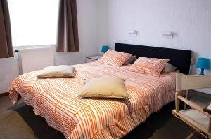 Postel nebo postele na pokoji v ubytování Hotel Halleux + 37 fotografií