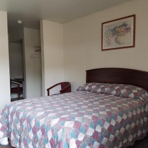 Postel nebo postele na pokoji v ubytování Greenwell Motel