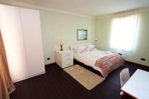 Postel nebo postele na pokoji v ubytování Apartment Larin