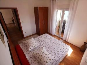 Postel nebo postele na pokoji v ubytování Beachfront Family Escape, Ciovo